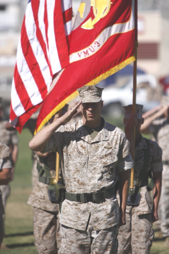 Lt. Col. James W. Frey, the outgoing commander, salutes before being presented a Meritorious Service Medal after relinquishing command of Marine Unmanned Aerial Vehicle Squadron 3 at Lance Cpl. Torrey L. Gray Field June 17. The squadron was turned over to Lt. Col. Timothy G. Burton.
